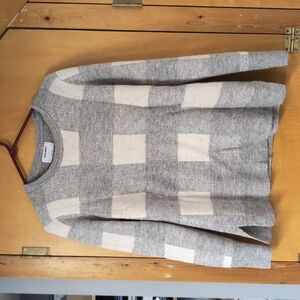 White and grey checkered sweater